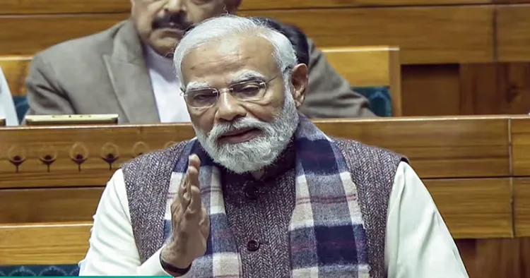 New Delhi, Dec 08 (ANI): Prime Minister Narendra Modi speaks in Lok Sabha during the winter session of Parliament, in New Delhi on Monday. (Sansad TV/ANI Video Grab)