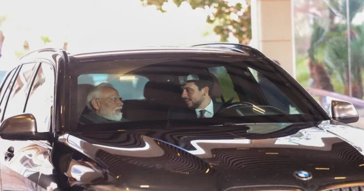 Crown Prince of Jordan Al Hussein drives PM Modi to the Museum