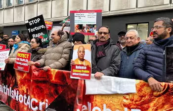 Indians and Bangladesh Hindus protesting against Hindu killings in Bangladesh outside the Bangladeshi High Commission in London. (ANI)