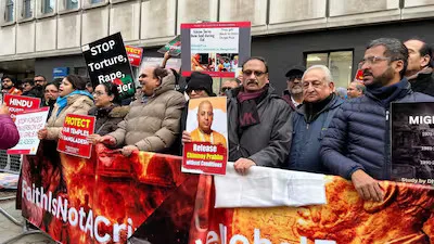 Indians and Bangladesh Hindus protesting against Hindu killings in Bangladesh outside the Bangladeshi High Commission in London. (ANI)
