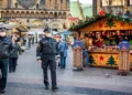 Police officers patrol the annual Christmas market in Magdeburg, Germany. On December 20, 2024, Taleb al-Abdulmohsen drove a car into a crowded open-air market, killing six people and injuring more than 300.