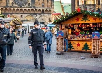 Police officers patrol the annual Christmas market in Magdeburg, Germany. On December 20, 2024, Taleb al-Abdulmohsen drove a car into a crowded open-air market, killing six people and injuring more than 300.