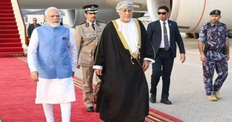 Prime Minister Narendra Modi with Oman Deputy Prime Minister for Defence Affairs Sayyid Shihab bin Tariq Al Said, as he arrives, in Muscat, Oman
