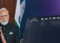 Prime Minister Narendra Modi (Left)