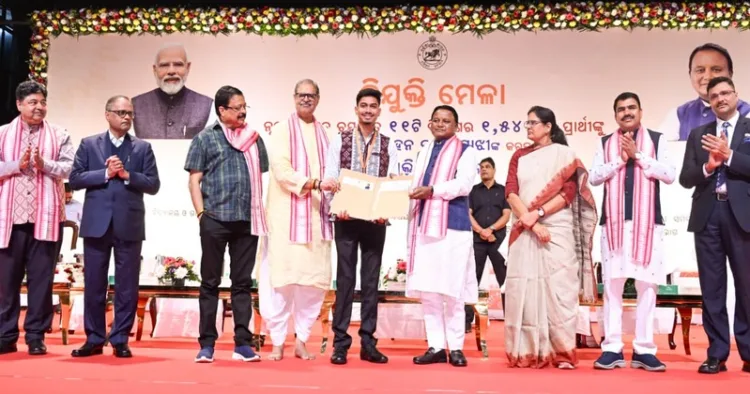 CM Moha Majhi and others distributing appointment letters to 1,543 candidates from 11 departments at the 14th Appointment Fair held at Bhubaneswar