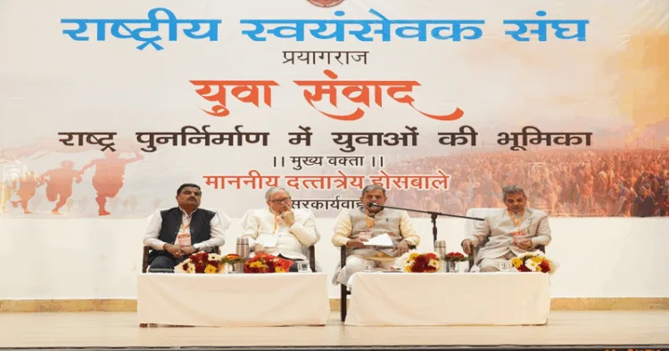RSS) Sarkaryavah Dattatreya Hosabale and other dignitaries on the stage at the programme “The Role of Youth in Nation Reconstruction” held at Motilal Nehru National Institute of Technology