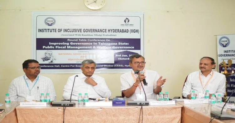 Dignitaries on the stage at IIGH round table focuses