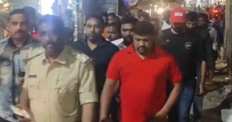 Police at the site of violence in JJ Nagar in Bengaluru where Muslim youths pelted stones at the procession of the Hindu Deity