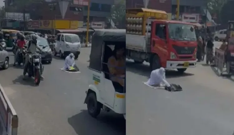 Woman offers namaz in middle of road in Palakkad