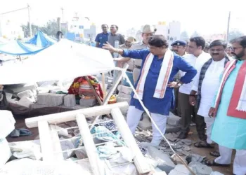 BJP leaders during their visit to Kogilu Layout in Bengaluru