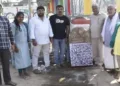 Archaeologists with the inscription at Sri Mahalakshmi Mandir