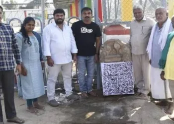 Archaeologists with the inscription at Sri Mahalakshmi Mandir