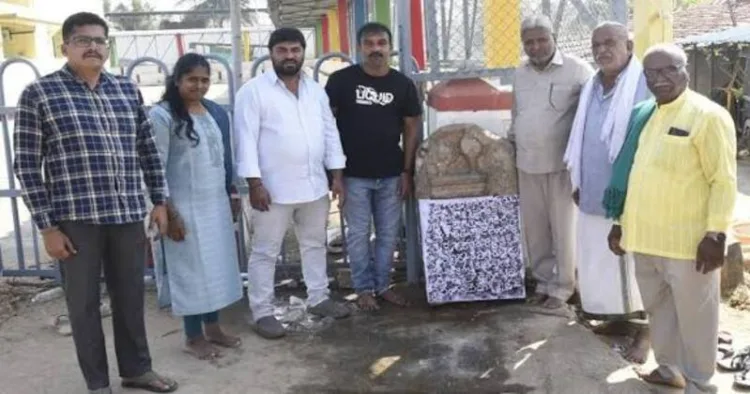 Archaeologists with the inscription at Sri Mahalakshmi Mandir