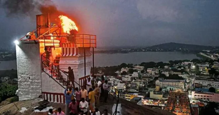 The Deepathoon sits on Thiruparankundram, home to one of the six sacred abodes of Murugan, a temple with layers of history, inscriptions, and devotional practice stretching back centuries