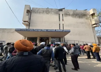 People standing outside Rupnagar District Court Complex after bomb threat. (Image via Tribune)