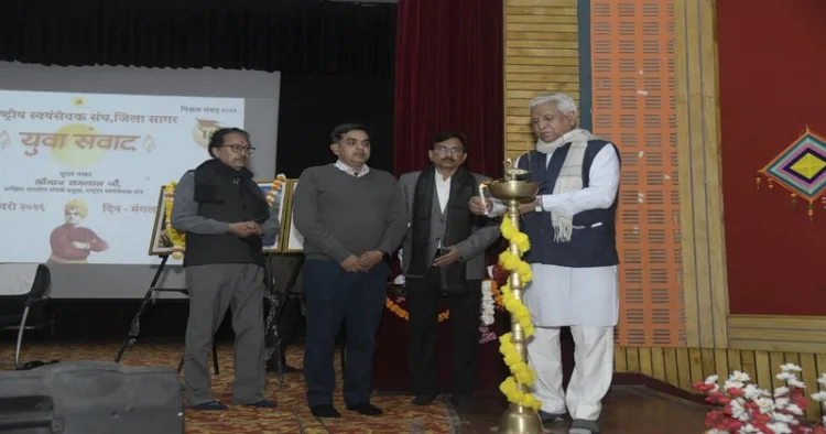 Ramlal, Akhil Bharatiya Sampark Pramukh of RSS at the “Yuva Samvad” (Youth Dialogue) programme, Sagar, Madhya Pradesh, lighting the ceremonial lamp