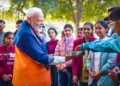 Prime Minister Narendra Modi distributes sweets among students while interacting with them on different aspects of stress-free exams under Pariksha Pe Charcha program in New Delhi (Photo: Old Image used for representative purposes)
