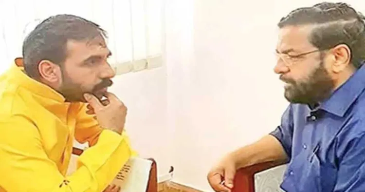 Prime accused Unnikrishnan Potty (Left) in conversation with former Devaswom Minister and CPI(M) leader Kadakampally Surendran (Right)