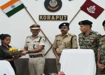 ACM-ranked Maoist Mamata Podiami surrenders to senior police officials in Koraput.