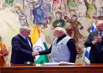 Jerusalem [Israel], Feb 25 (ANI): Prime Minister Narendra Modi exchanges a handshake with Israeli Prime Minister Benjamin Netanyahu at the Knesset, Israeli parliament, in Jerusalem on Wednesday. Israeli PM Benjamin Netanyahu's wife Sara Netanyahu and Speaker of the Knesset, Amir Ohana also present. (DPR PMO/ANI Photo)