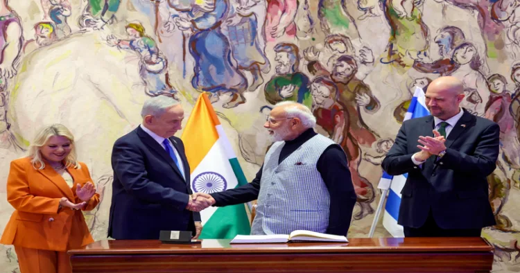 Jerusalem [Israel], Feb 25 (ANI): Prime Minister Narendra Modi exchanges a handshake with Israeli Prime Minister Benjamin Netanyahu at the Knesset, Israeli parliament, in Jerusalem on Wednesday. Israeli PM Benjamin Netanyahu's wife Sara Netanyahu and Speaker of the Knesset, Amir Ohana also present. (DPR PMO/ANI Photo)
