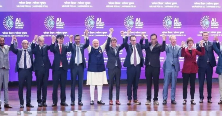 Prime Minister Narendra Modi (centre) joins hands with Google CEO Sundar Pichai, OpenAI CEO Sam Altman and others during the India AI Impact Summit 2026, in New Delhi. | Photo: YouTube/@NarendraModi