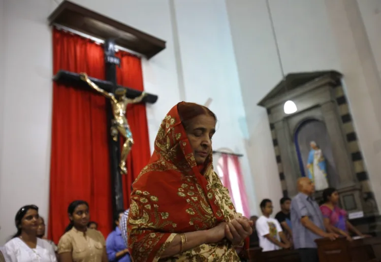 A converted woman standing inside the Church (Representative image)