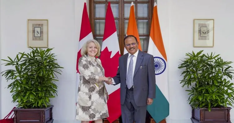 Canadian Intelligence Officer Nathalie Drouin with NSA Ajit Doval