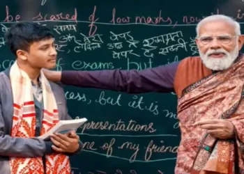PM Modi with a student