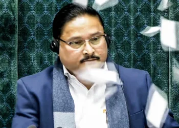 Opposition MPs throw papers towards the Presiding officer Dilip Saikia during an uproar after Lok Sabha LoP Rahul Gandhi sought to quote an article citing former Army Chief MM Naravane’s unpublished book