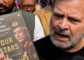 LoP Rahul Gandhi speaks to the media as he shows a copy of the 'unpublished' memoir of former Army chief General M M Naravane outside the Parliament House in New Delhi
