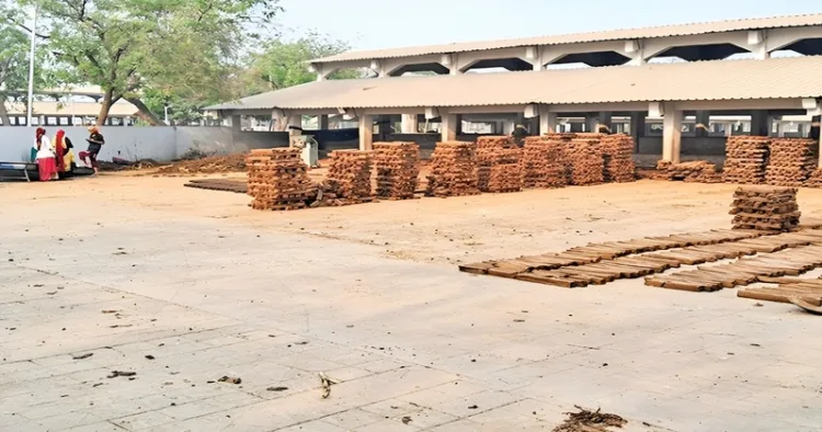 Cow-dung sticks to replace wood this Holikadahan