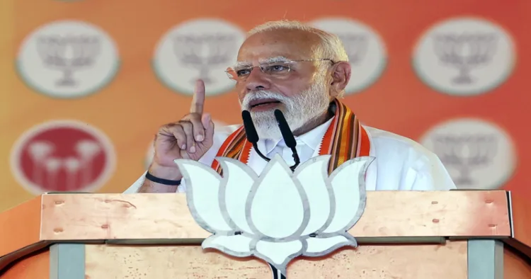 Palakkad [Keralam], Mar 29 (ANI): Prime Minister Narendra Modi addresses a public gathering, in Palakkad on Sunday. (Narendra Modi Photo Gallery/ANI Photo)