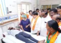 BJP Telangana State President N Ramchander Rao interacts with injured BJP workers undergoing treatment at Nalgonda hospital