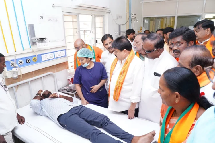 BJP Telangana State President N Ramchander Rao interacts with injured BJP workers undergoing treatment at Nalgonda hospital