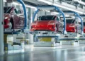Electric vehicles being manufactured in a factory