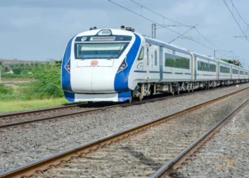 Vande Bharat running on the railway tracks