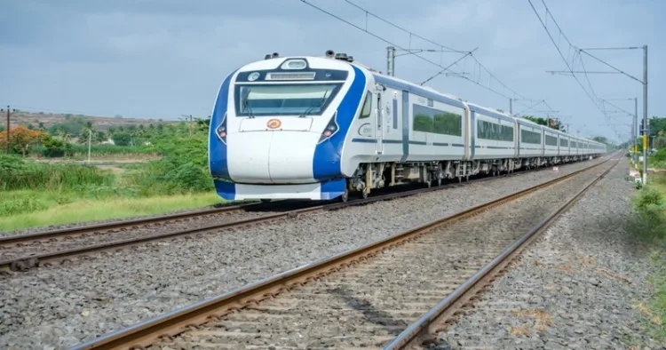 Vande Bharat running on the railway tracks