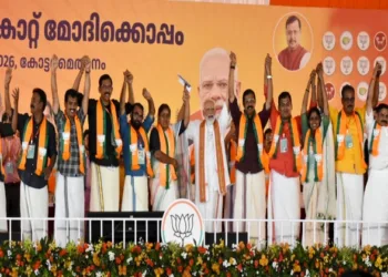 PM Narendra Modi on the stage with others during a rally in Keralam