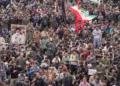 People gather during a protest against the killing of Iran's late Supreme Leader Ayatollah Ali Khamenei