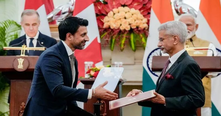 PM Modi and PM Mark Carney witness an MoU exchange between EAM S Jaishankar and Canada's Minister of International Trade Maninder Sidhu during a joint press meet, at Hyderabad House in New Delhi, Monday, March 2, 2026