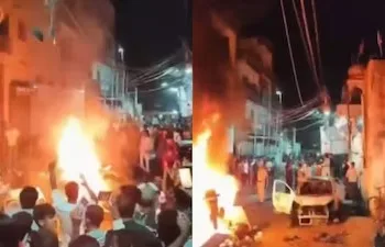 A car and a motorcycle were set on fire amid protests. (Photo: PTI)