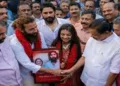 Monalisa's husband Mohammed Farman Khan shakes hands with CPI(M) State Secretary M. V.Govindan as Kerala Education Minister V. Sivankutty,Rajya Sabha MP A. A. Rahim and CPI(M) leader V. P. P.Mustafa stand beside them