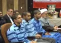 Iran's state media released footage on Thursday of the three men at their trial