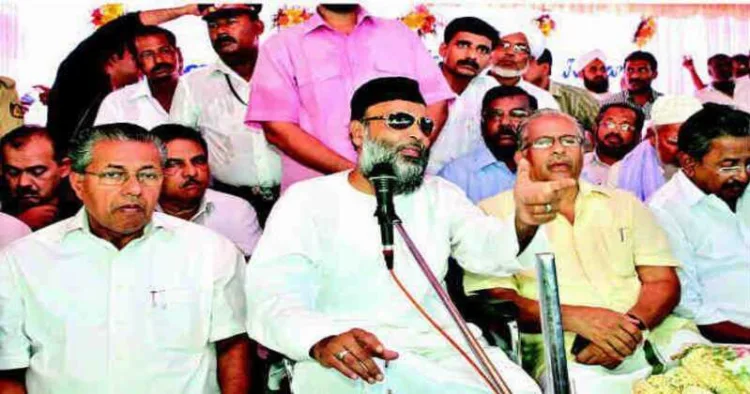 Then CPI(M) state secretary Pinarayi Vijayan (left) and Indian Union Muslim League Lok Sabha member E.T. Mohammed Basheer (right) sat on either side of PDP terrorist Abdul Nasser Madani