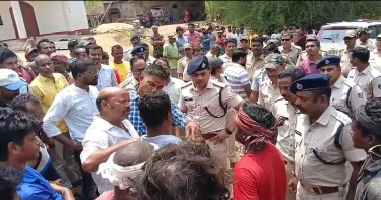 Villagers protesting near Church at Murga Gotha village, located within the Anandapur police station area