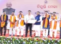 Chief Minister Mohan Charan Majhi along with other dignitaries at the 15th Recruitment Fair held at Kalinga Stadium