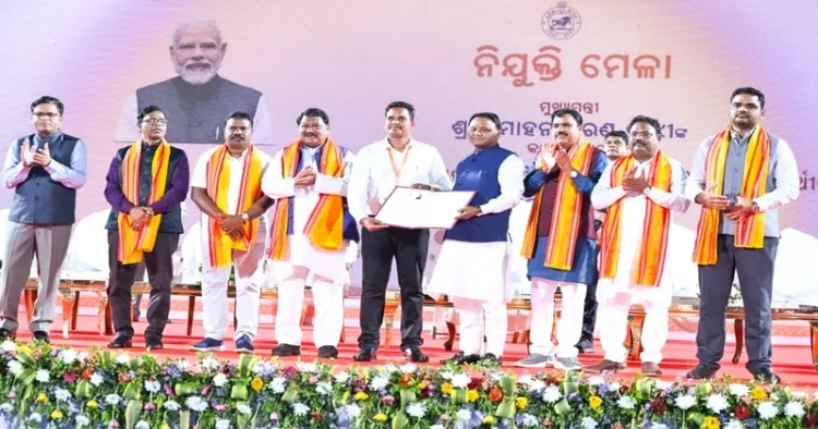 Chief Minister Mohan Charan Majhi along with other dignitaries at the 15th Recruitment Fair held at Kalinga Stadium