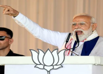 Barpeta, Apr 06 (ANI): Prime Minister Narendra Modi speaks during a public event, in Barpeta on Monday. (ANI Photo)