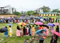 Guwahati [Assam], Apr 09 (ANI): Voters queue up as they wait to cast their votes amid rain at the polling station during the Assam Assembly Elections 2026 in Guwahati on Thursday. (ANI Photo)